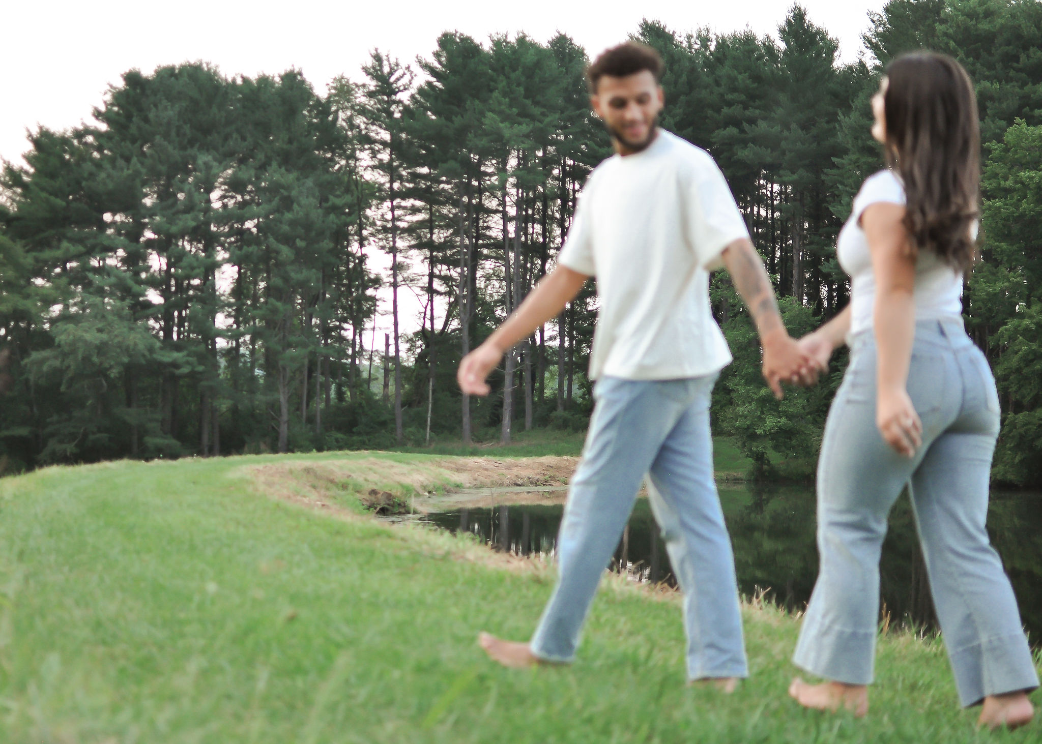 Ellie and Jaiden walking together, laughing